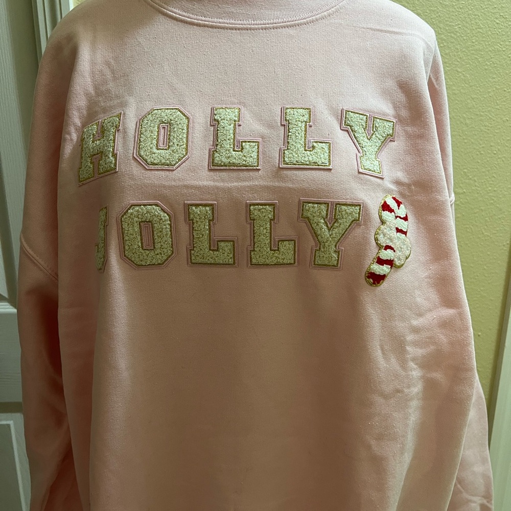 NEW Holly Jolly Pink Sweatshirt white puffy lettering and candy cane accent. XL